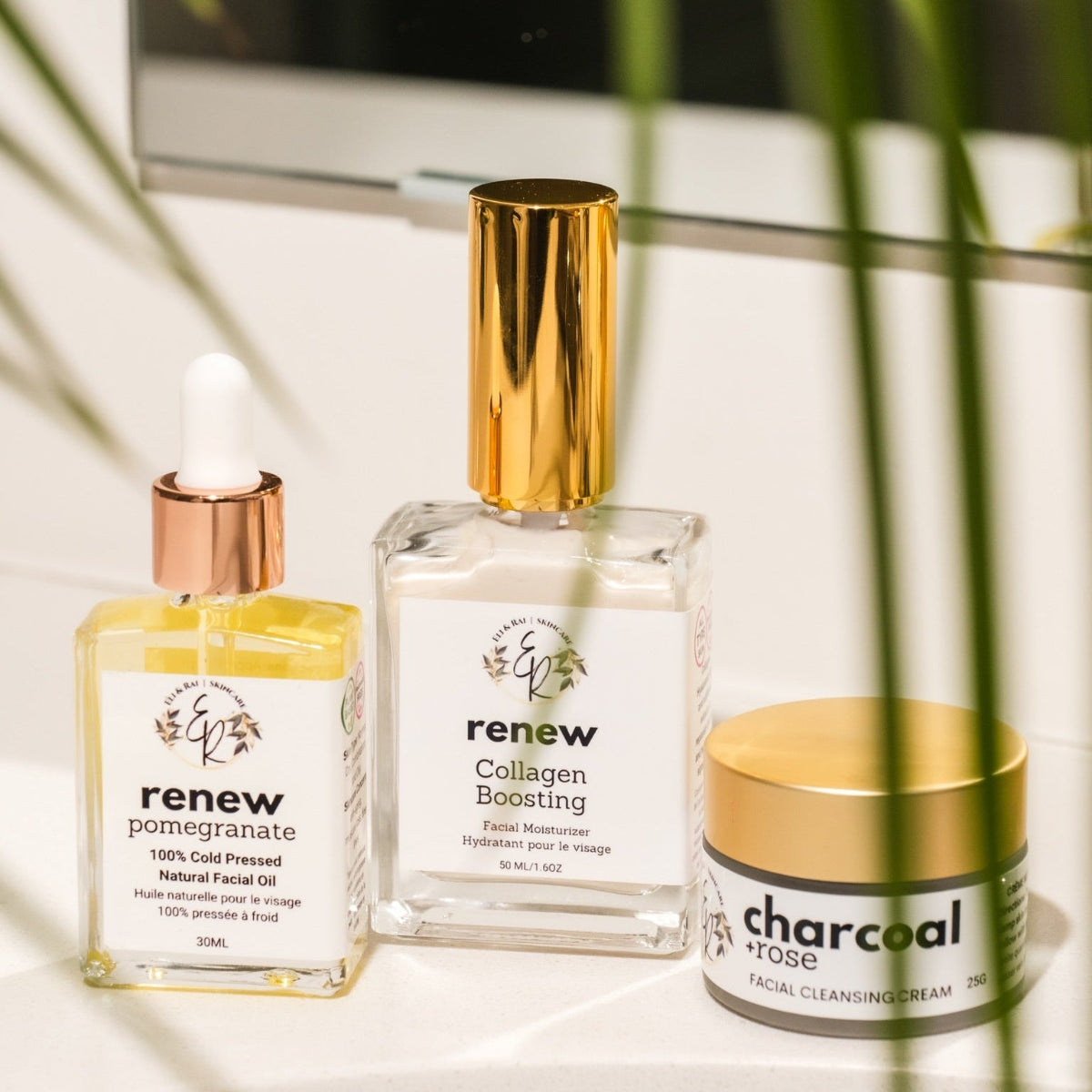 Eli and Rai plant-based skincare collection featuring a gentle face cleanser, hydrating facial serum, and rich moisturizing body cream.