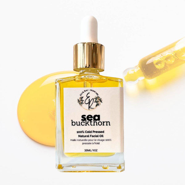 Sea buckthorn facial oil bottle with dropper on a white background